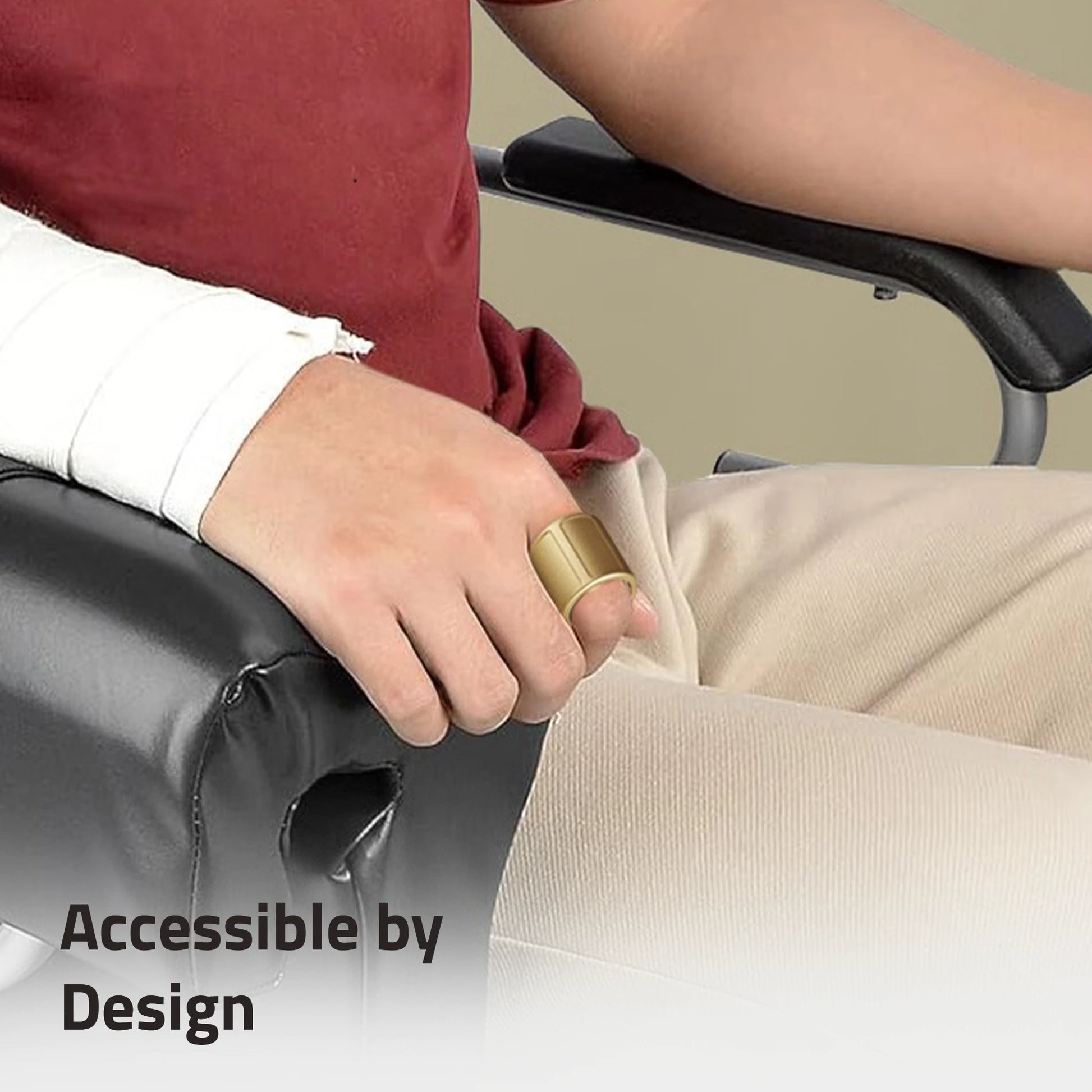 Person using Prolo Ring on a gray chair.  Accessible by Design